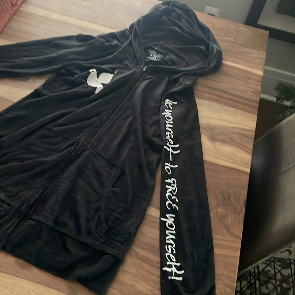 Be free apparel. Size Medium. Lightweight zippy, see-through look.